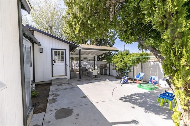 1222 W Kettering St, Lancaster, CA 93534 - view of patio featuring a grill