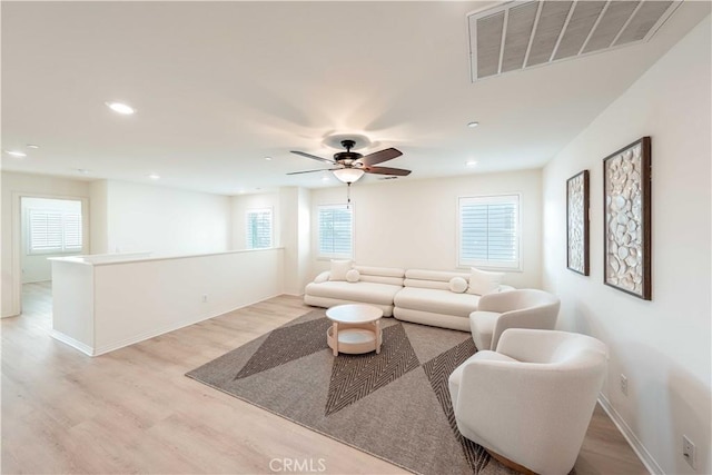 6940 Lagoon Ct, Jurupa Valley, CA 91752 - living room featuring plenty of natural light, light wood-style floors, recessed lighting, and ceiling fan