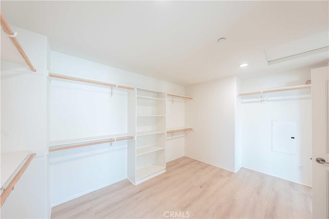 6940 Lagoon Ct, Jurupa Valley, CA 91752 - walk in closet with light wood-type flooring