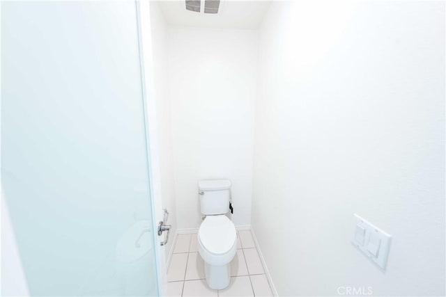 6940 Lagoon Ct, Jurupa Valley, CA 91752 - bathroom with toilet and tile patterned floors
