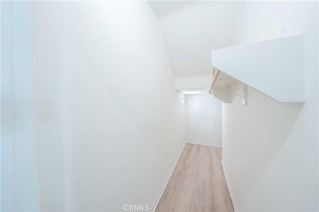 6940 Lagoon Ct, Jurupa Valley, CA 91752 - spacious closet featuring light wood-style floors