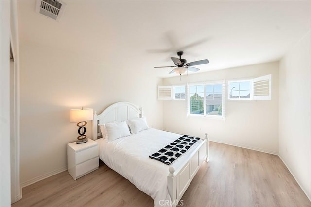 6940 Lagoon Ct, Jurupa Valley, CA 91752 - bedroom featuring light wood-style flooring and a ceiling fan