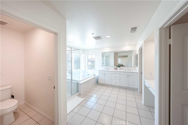 6940 Lagoon Ct, Jurupa Valley, CA 91752 - full bath with double vanity, a bath, tile patterned flooring, and recessed lighting