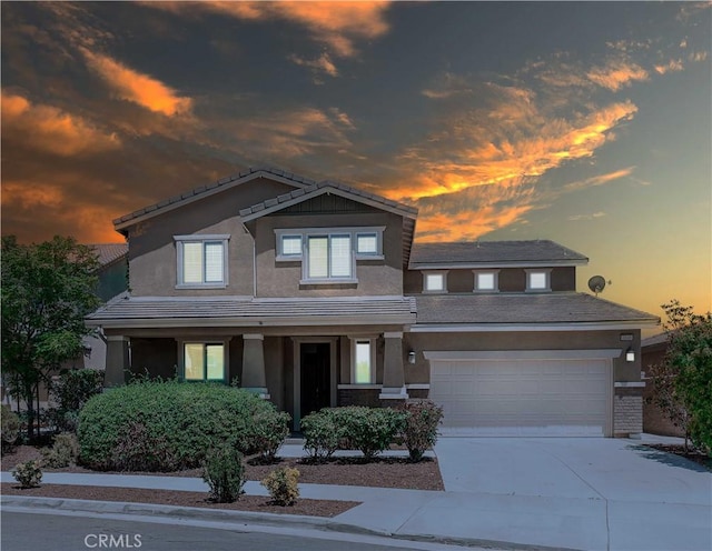 6940 Lagoon Ct, Jurupa Valley, CA 91752 - view of front facade featuring stucco siding, driveway, and a tile roof