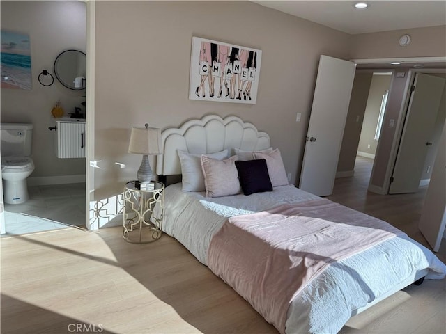 135 Ricci Ave, Walnut, CA 91789 - bedroom featuring baseboards, wood finished floors, recessed lighting, and ensuite bathroom