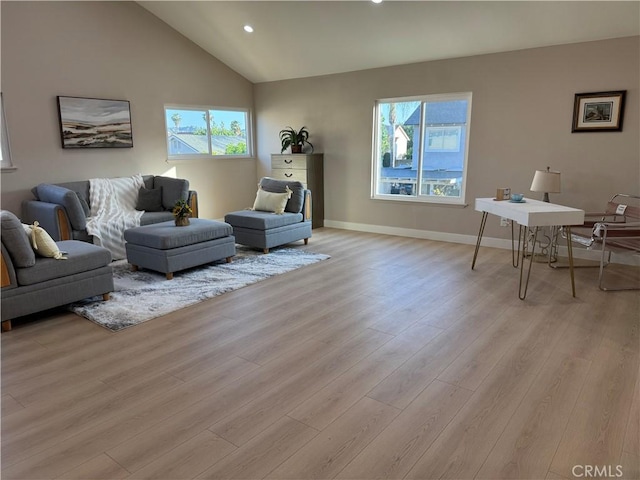 135 Ricci Ave, Walnut, CA 91789 - living area with healthy amount of natural light, light wood-style floors, vaulted ceiling, recessed lighting, and baseboards