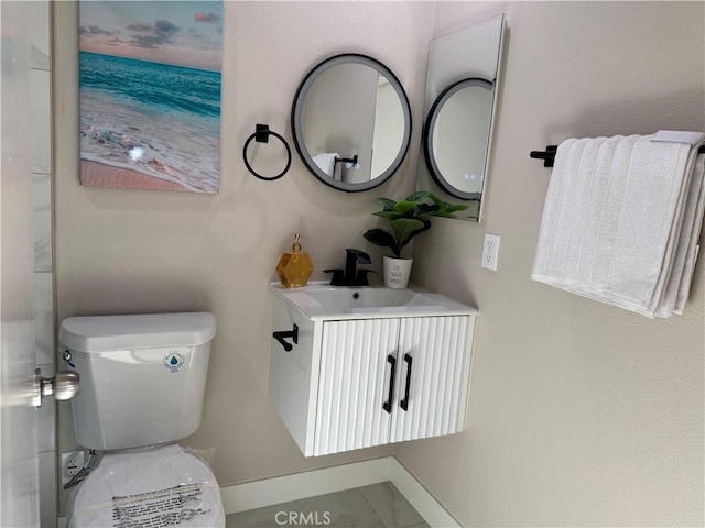 135 Ricci Ave, Walnut, CA 91789 - half bathroom featuring toilet, vanity, and baseboards