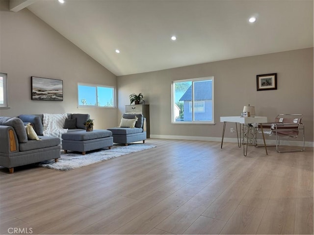 135 Ricci Ave, Walnut, CA 91789 - living area with wood finished floors, healthy amount of natural light, high vaulted ceiling, recessed lighting, and baseboards