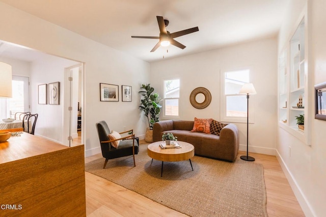 3538 Sierra St, Los Angeles, CA 90031 - living room featuring light wood-style floors, ceiling fan, and baseboards