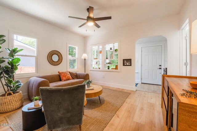 3538 Sierra St, Los Angeles, CA 90031 - living area with ceiling fan, healthy amount of natural light, light wood-style floors, and arched walkways