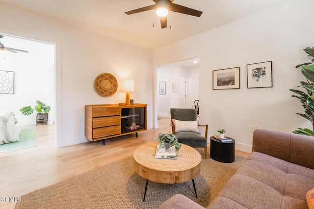 3538 Sierra St, Los Angeles, CA 90031 - living area with ceiling fan, light wood finished floors, and baseboards