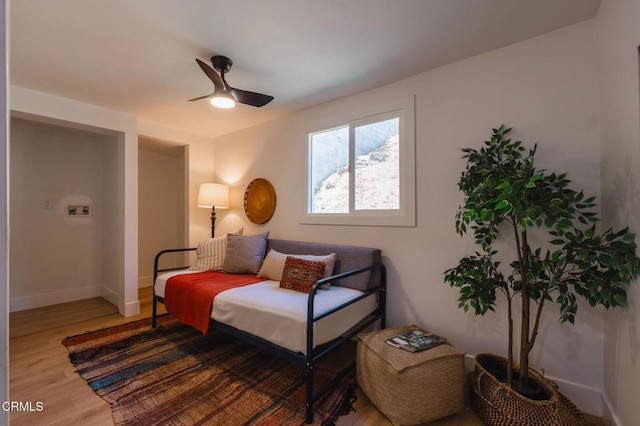 3538 Sierra St, Los Angeles, CA 90031 - sitting room featuring a ceiling fan, wood finished floors, and baseboards