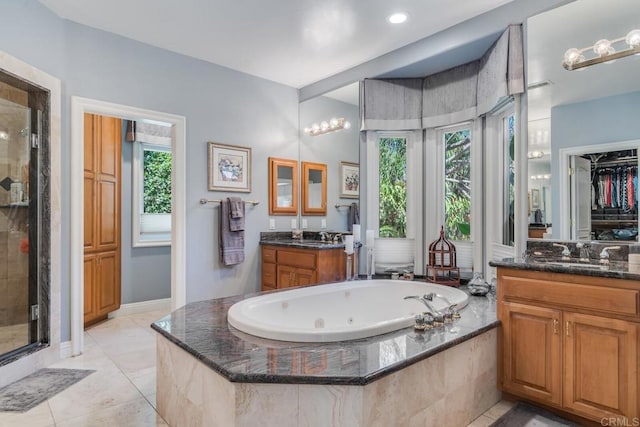 4014 Millagra Dr, Fallbrook, CA 92028 - bathroom with a stall shower, vanity, a tub with jets, and tile patterned floors