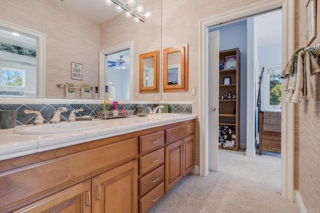 4014 Millagra Dr, Fallbrook, CA 92028 - bathroom with double vanity, healthy amount of natural light, and decorative backsplash