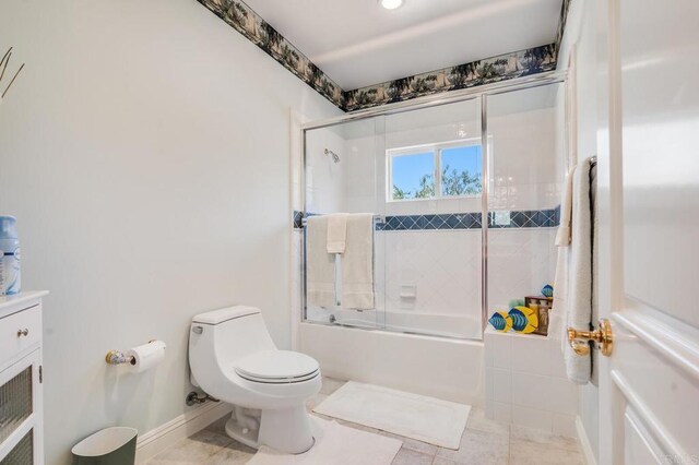 4014 Millagra Dr, Fallbrook, CA 92028 - bathroom featuring toilet, enclosed tub / shower combo, tile patterned floors, and baseboards