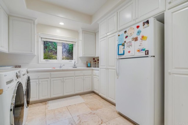 4014 Millagra Dr, Fallbrook, CA 92028 - laundry area featuring cabinet space, washing machine and dryer, and recessed lighting