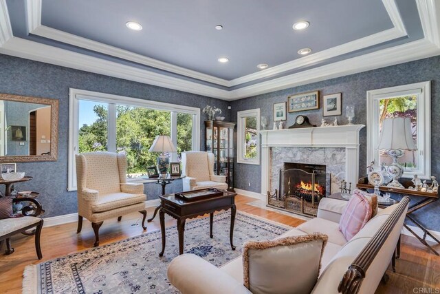 4014 Millagra Dr, Fallbrook, CA 92028 - living area with crown molding, wallpapered walls, a raised ceiling, a premium fireplace, and wood finished floors