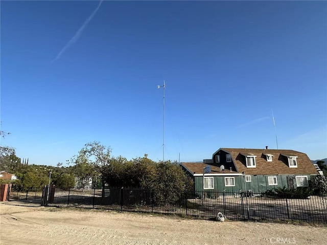 60645 Lupin Ln, Anza, CA 92539 - view of front facade with a fenced front yard and roof with shingles