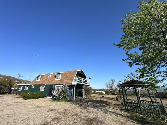 60645 Lupin Ln, Anza, CA 92539 - rear view of property featuring a gazebo and a gambrel roof