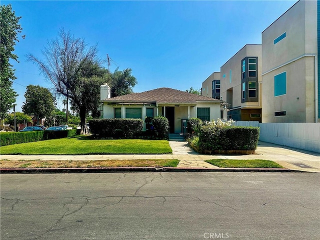 10802 Morrison St, North Hollywood, CA 91601 - view of front of home featuring stucco siding and a chimney