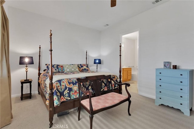 19344 Macklin St, Apple Valley, CA 92308 - bedroom with light colored carpet, baseboards, connected bathroom, and a ceiling fan