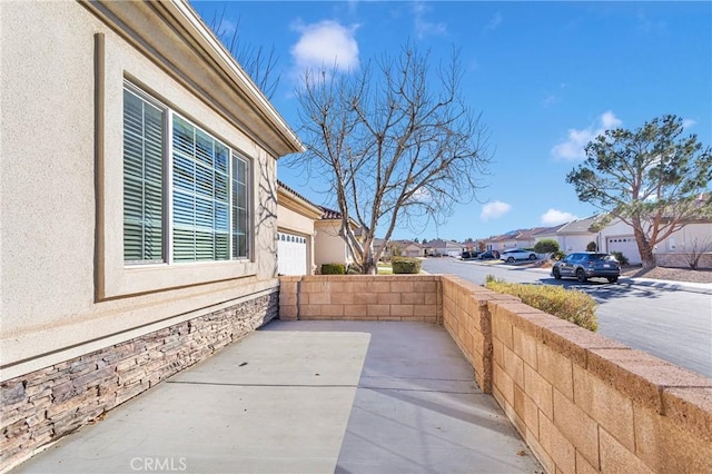 19344 Macklin St, Apple Valley, CA 92308 - view of patio featuring a residential view