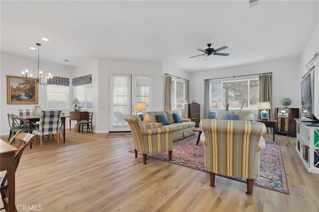 19344 Macklin St, Apple Valley, CA 92308 - living room with a chandelier, light wood finished floors, healthy amount of natural light, ceiling fan, and recessed lighting