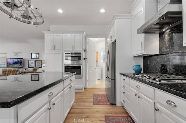 19344 Macklin St, Apple Valley, CA 92308 - kitchen with ventilation hood, stainless steel appliances, white cabinetry, light wood-style floors, and recessed lighting