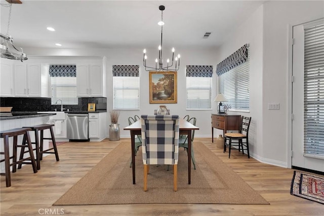 19344 Macklin St, Apple Valley, CA 92308 - dining space with a chandelier, recessed lighting, light wood-type flooring, and baseboards