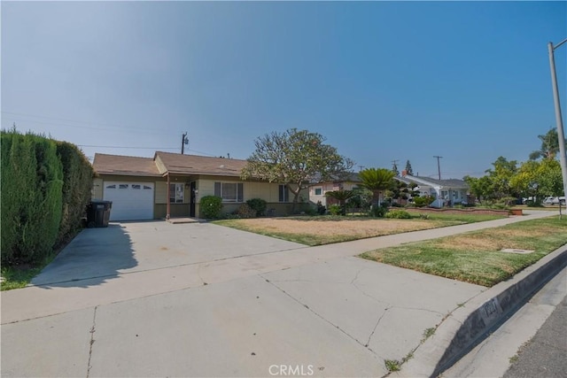 7227 Farmland Ave, Pico Rivera, CA 90660 - ranch-style home featuring concrete driveway and a garage