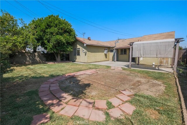 7227 Farmland Ave, Pico Rivera, CA 90660 - back of house with a patio area and stucco siding