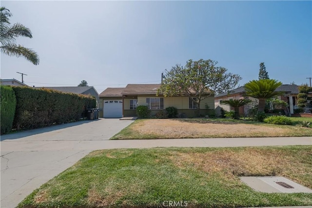 7227 Farmland Ave, Pico Rivera, CA 90660 - ranch-style home with an attached garage, concrete driveway, and a front lawn