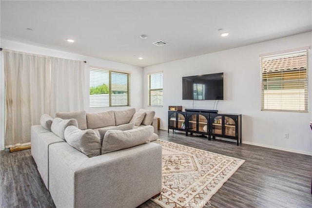 1737 Arcus Ct, Beaumont, CA 92223 - living room with wood finished floors, baseboards, and recessed lighting