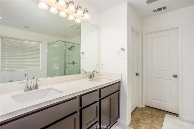1737 Arcus Ct, Beaumont, CA 92223 - bathroom featuring a shower stall and double vanity