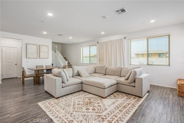 1737 Arcus Ct, Beaumont, CA 92223 - living area with wood finished floors, baseboards, recessed lighting, and stairway