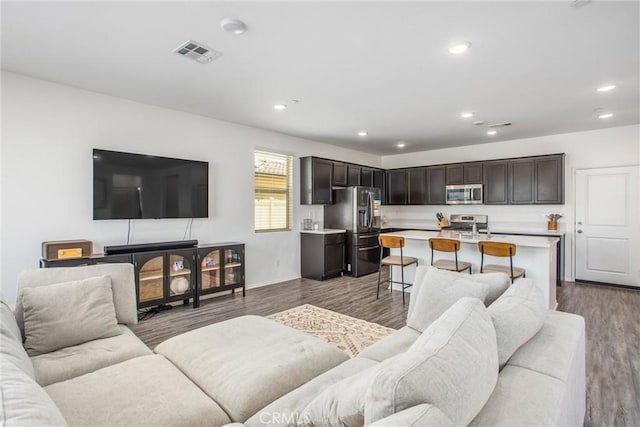 1737 Arcus Ct, Beaumont, CA 92223 - living area with recessed lighting, wood finished floors, and baseboards