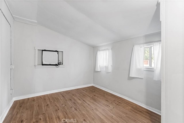 59485 State Highway 74, Mountain Center, CA 92561 - spare room featuring vaulted ceiling, wood finished floors, and baseboards