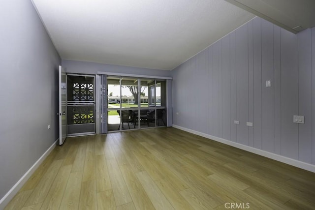 13881 Thunderbird Dr Unit M1-63E, Seal Beach, CA 90740 - spare room featuring light wood-style flooring and baseboards