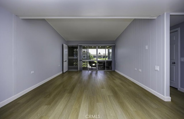 13881 Thunderbird Dr Unit M1-63E, Seal Beach, CA 90740 - spare room featuring wood finished floors and baseboards