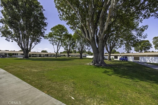13881 Thunderbird Dr Unit M1-63E, Seal Beach, CA 90740 - view of property's community with a lawn