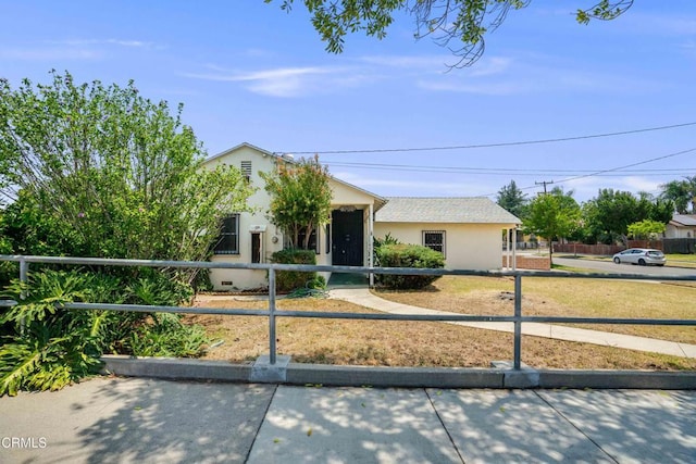8730 Marshall St, Rosemead, CA 91770 - view of front of home with stucco siding and a fenced front yard