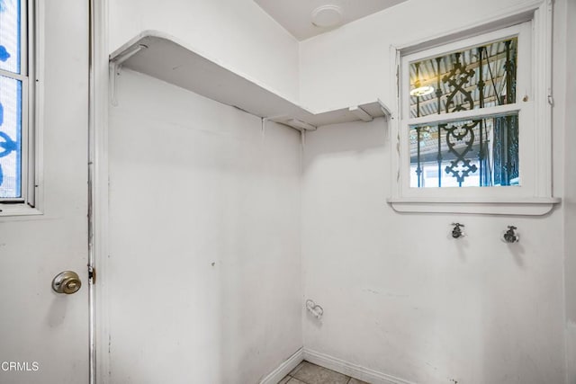 8730 Marshall St, Rosemead, CA 91770 - laundry area with tile patterned flooring and baseboards