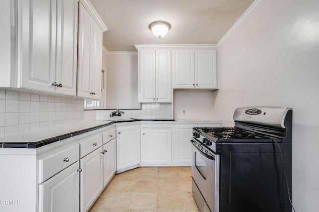 8730 Marshall St, Rosemead, CA 91770 - kitchen featuring gas range, backsplash, white cabinetry, tile countertops, and crown molding