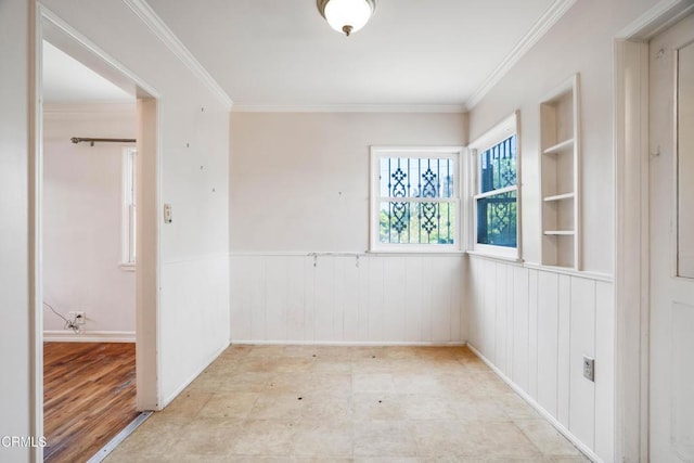 8730 Marshall St, Rosemead, CA 91770 - empty room with a wainscoted wall and crown molding