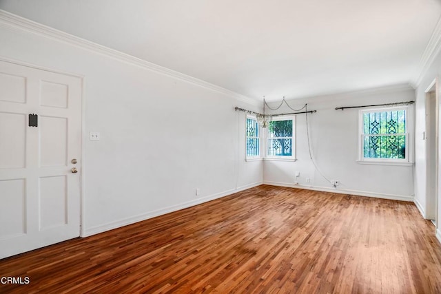 8730 Marshall St, Rosemead, CA 91770 - unfurnished room with wood finished floors, crown molding, and baseboards