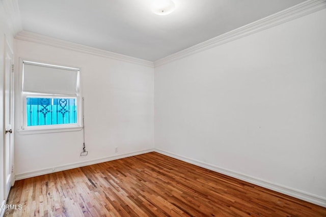 8730 Marshall St, Rosemead, CA 91770 - empty room featuring wood finished floors, baseboards, and crown molding