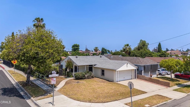 8730 Marshall St, Rosemead, CA 91770 - ranch-style house with driveway, an attached garage, a front lawn, and stucco siding