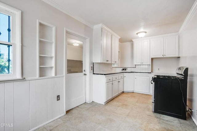 8730 Marshall St, Rosemead, CA 91770 - kitchen with gas stove, decorative backsplash, white cabinetry, and crown molding
