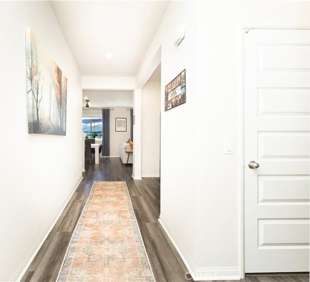 28252 Farm Creek Way, Valley Center, CA 92082 - corridor with dark wood-style flooring and baseboards