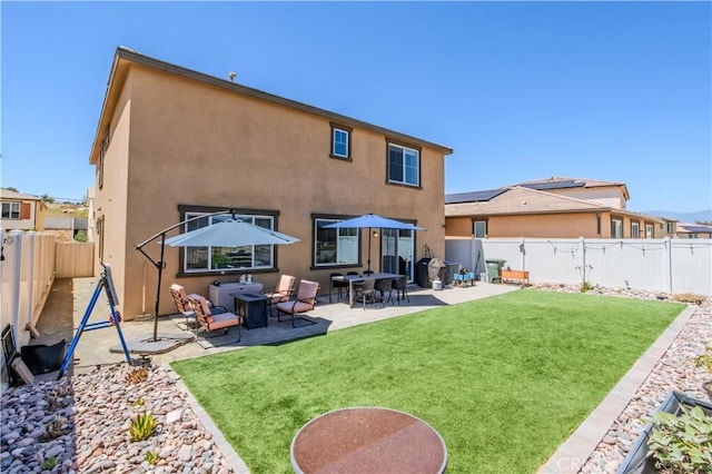 28252 Farm Creek Way, Valley Center, CA 92082 - back of property with a fenced backyard, a patio area, and stucco siding